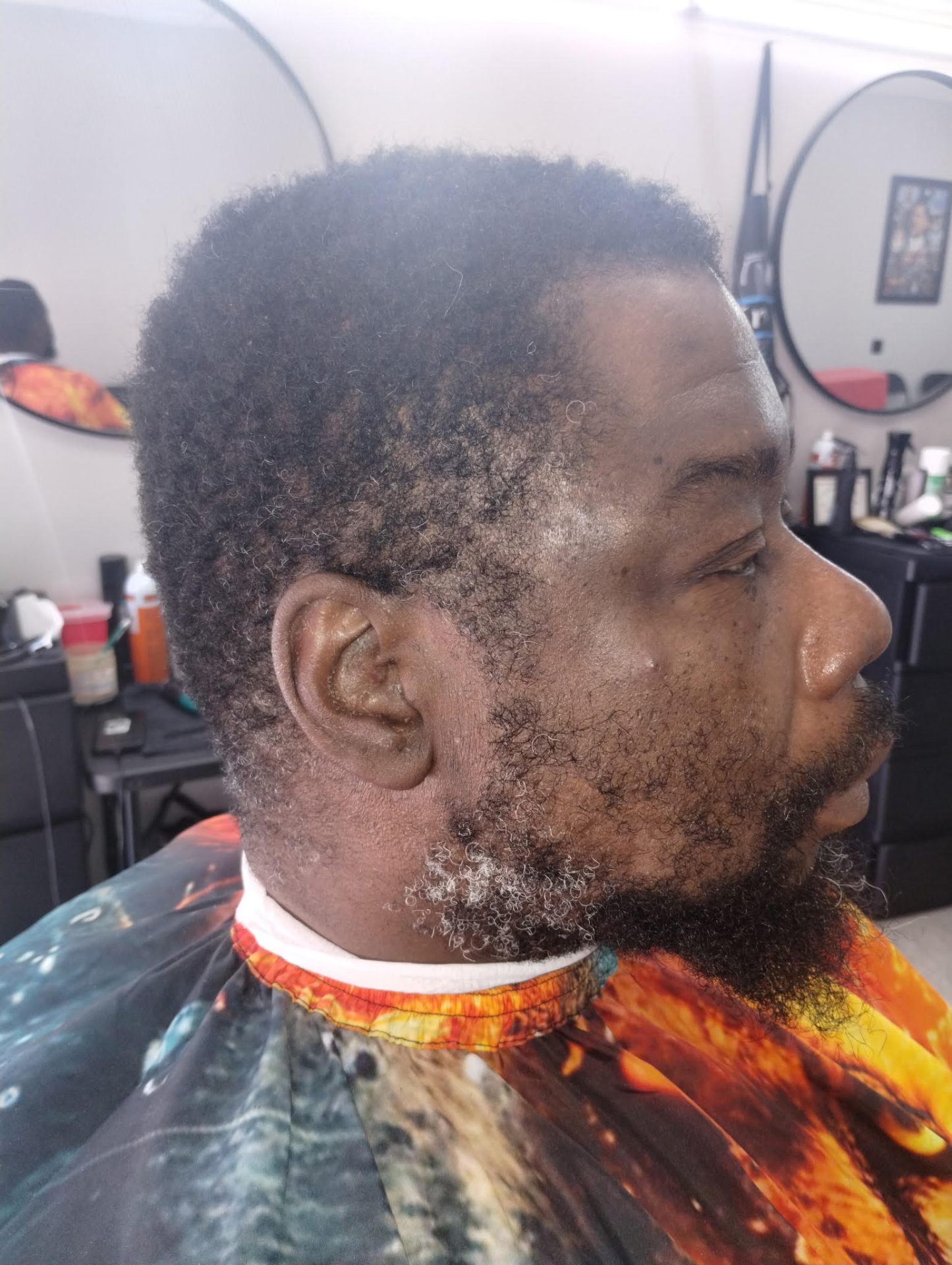 Natural afro with crisp temple lineup