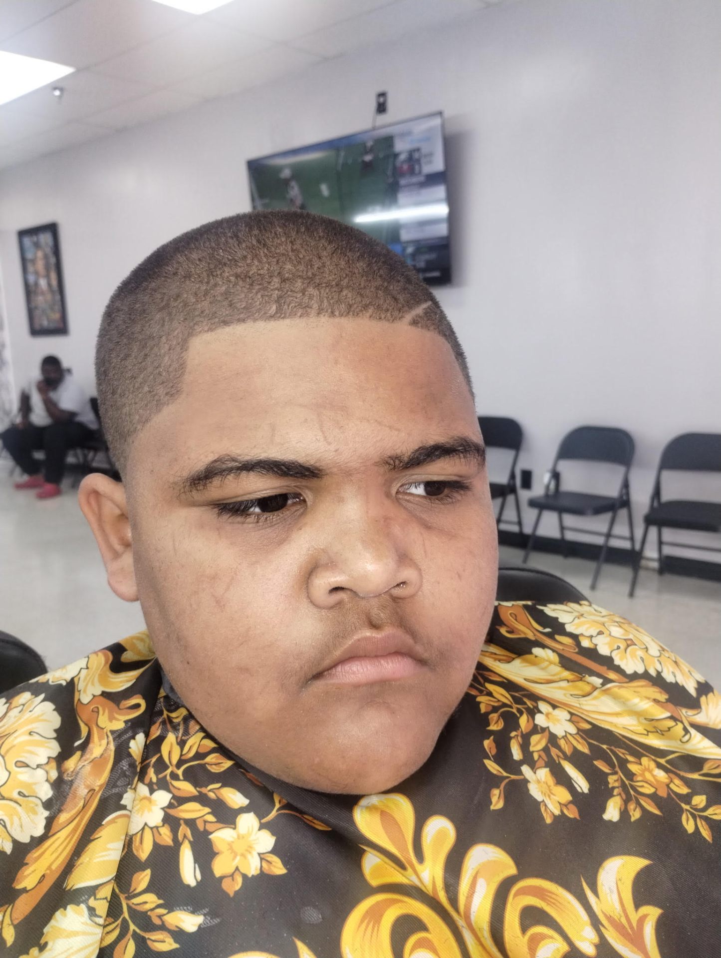 Low skin fade with design detail