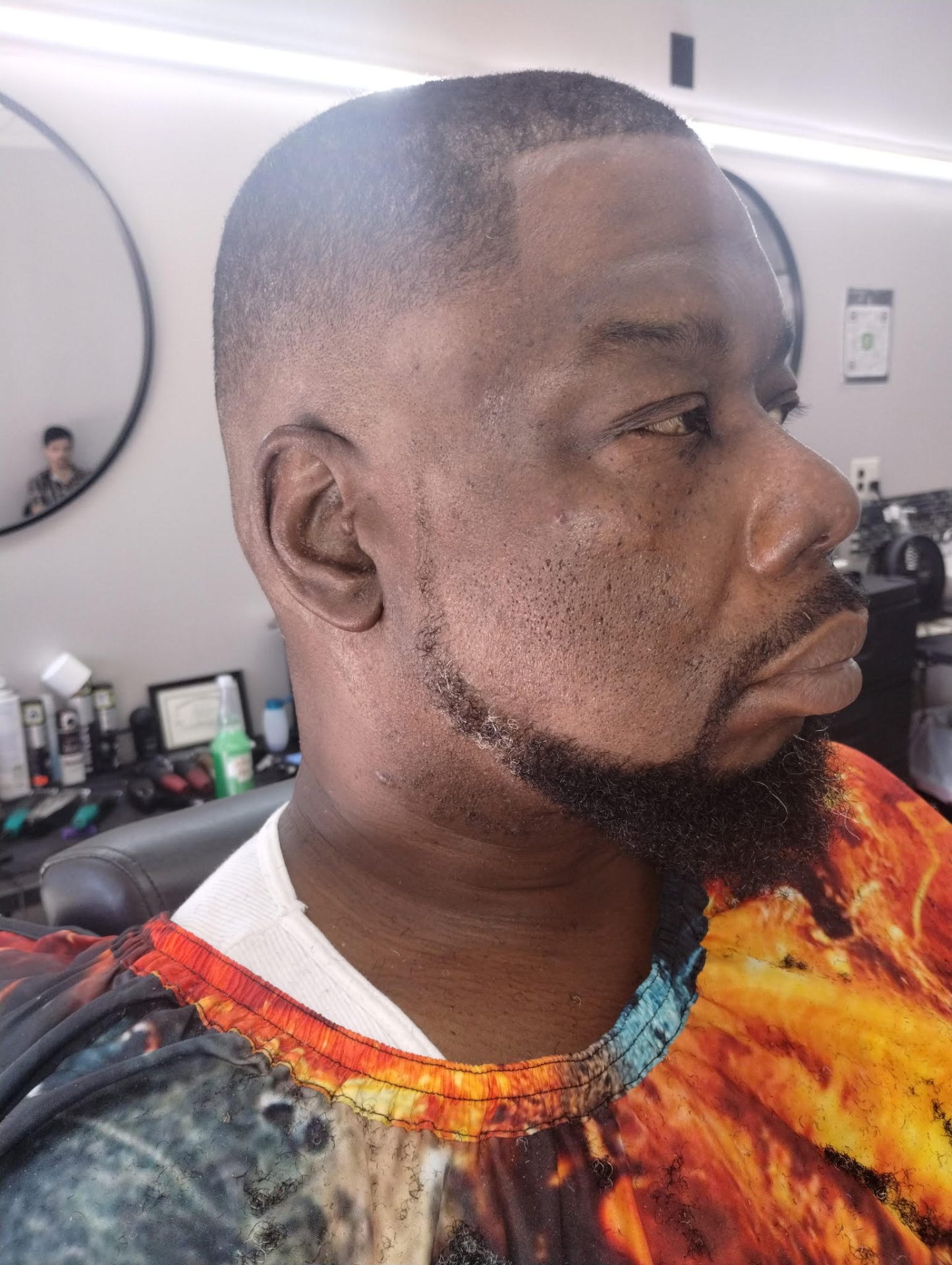 Bald fade paired with shaped beard